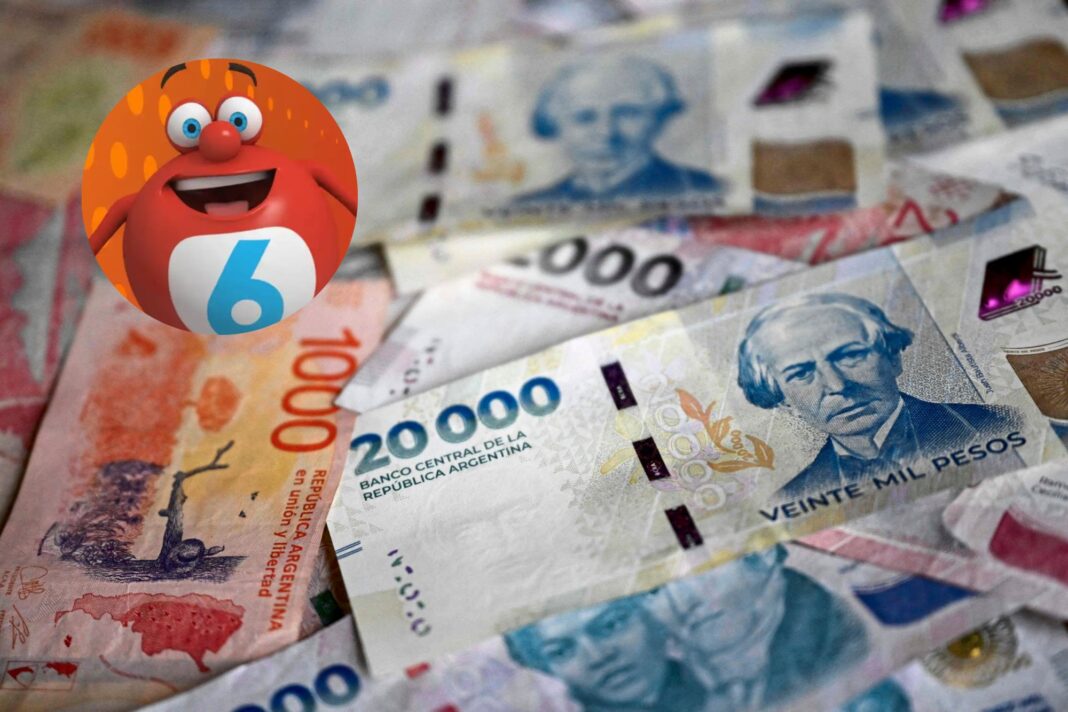 Cartón de Quini 6 con números ganadores y billetes de lotería